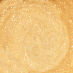 A close up of Gold sugar scrub texture with illuminating gold gold colour.